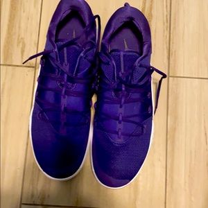 Purple Pair of Nike Zoom Size 17.5 in shoes.